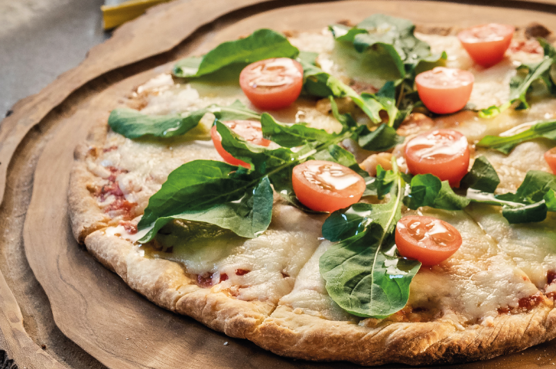 Pizza con Muzzarella, tomate y rúcula